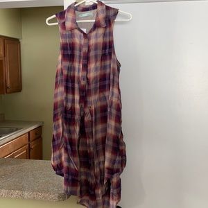 Tunic length button down sleeveless shirt